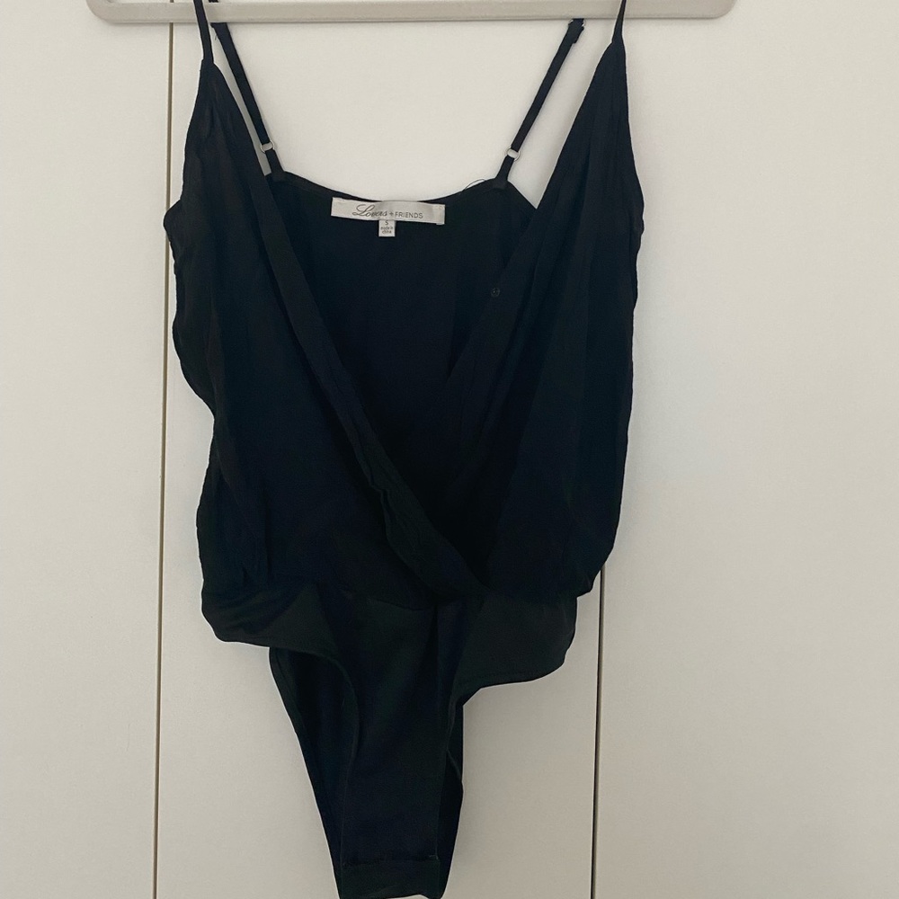 Lovers + Friends black plunge bodysuit.